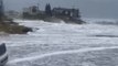 Storm surge from Nicole rips apart roads