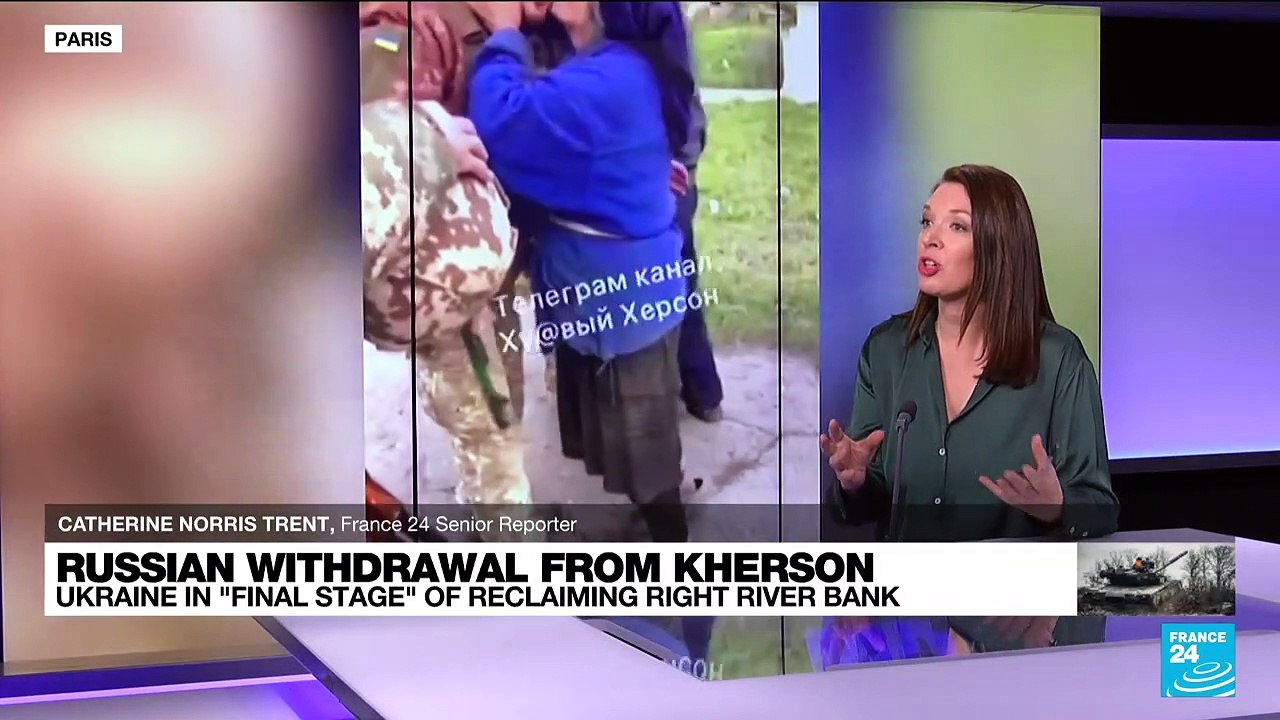 Ukrainian forces entering Kherson after Russian retreat