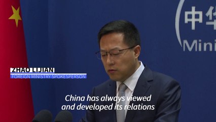 China says US should help get relations on 'right track'