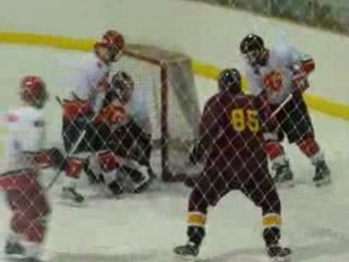 Ginsberg almost scores from the side of the net