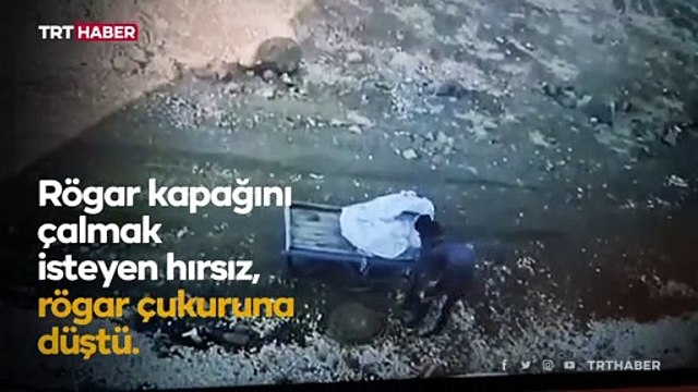 Rögar kapağını çalmak isteyen hırsız çukura düştü