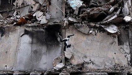 Banksy unveils new artwork on war-torn Ukrainian building