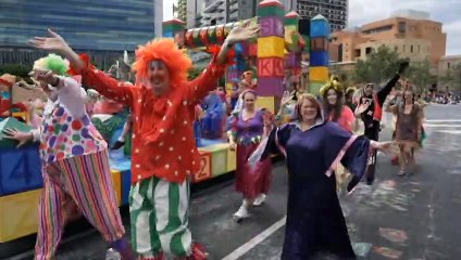 The threat of thunder and torrential rain couldn't keep a quarter of a million people from attending Adelaide's Christmas Pageant
