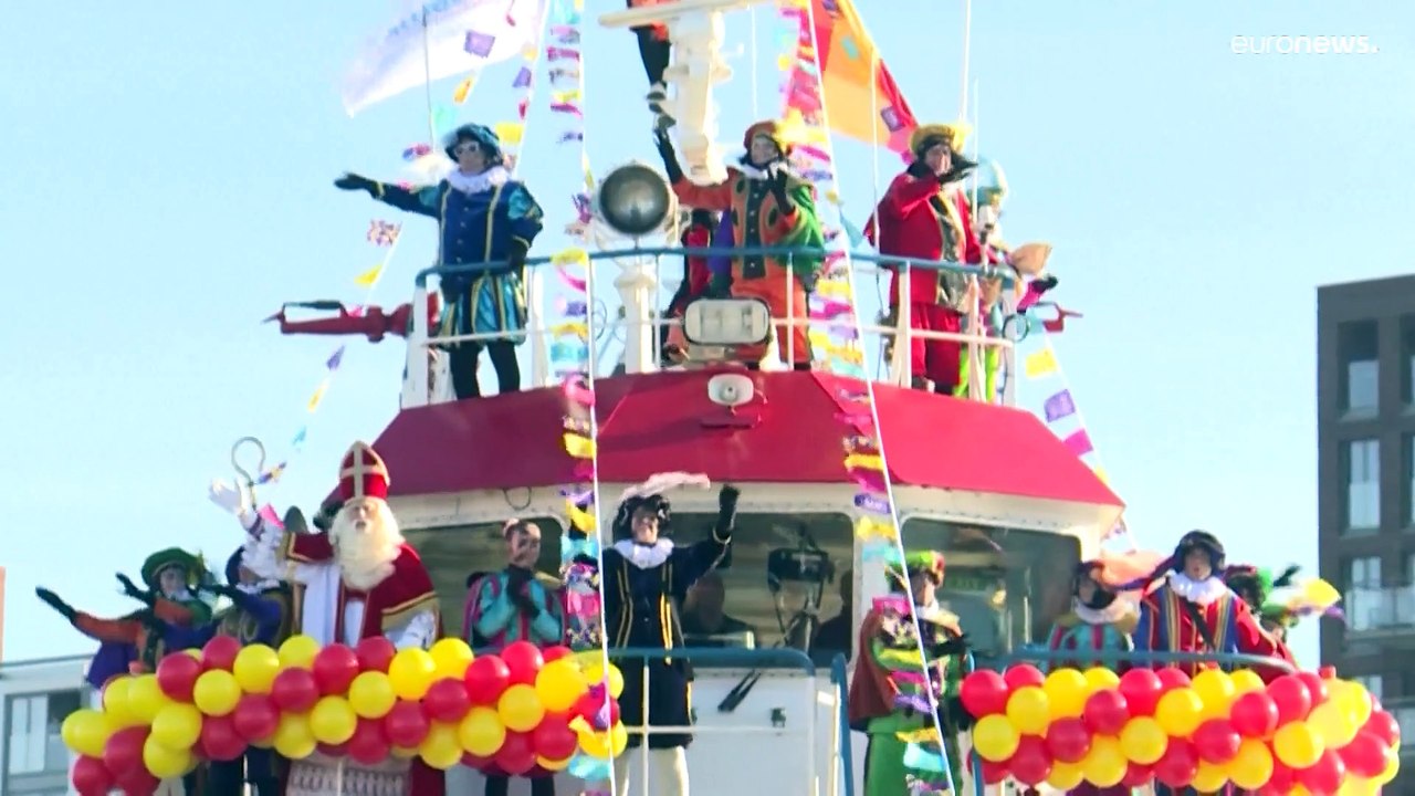 Zankapfel 'Zwarte Piet': Schwarz geschminkte Gesichter in Den Haag