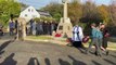 The laying of poppy wreaths at Albaston War Memorial as part of the Remembrance Day service.