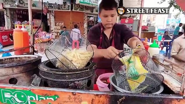 Loaded french fries, Hardworking boy making most tasty french fries | Asian street food