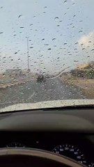 Orange skies punctuated with white clouds as scattered rainfall hits parts of country