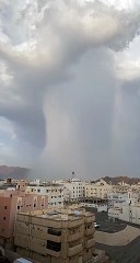 موثقة فيديو "قنبلة المطر" بجبل أحُد: تصوير الطبيعة عشق.. وبيع الكنافة عمل اشتهرت به