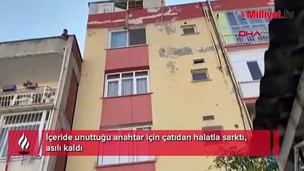 İçeride unuttuğu anahtar için çatıdan halatla sarktı, asılı kaldı