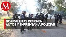 Presuntos normalistas detuvieron vehículos y se enfrentaron con policías en Michoacán