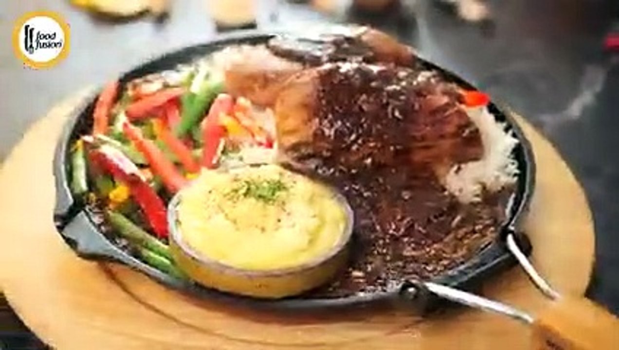 Mouth watering sizzling grilled chicken with garlic pepper sauce