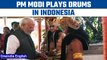 PM Modi plays drums in Indonesia before addressing Indian diaspora | Oneindia News *News