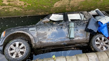 Land Rover found floating on its side in West Midlands canal