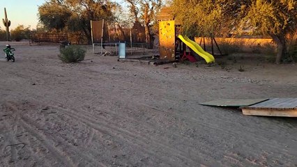 Kiddo Crashes Dirt Bike on Homemade Ramp