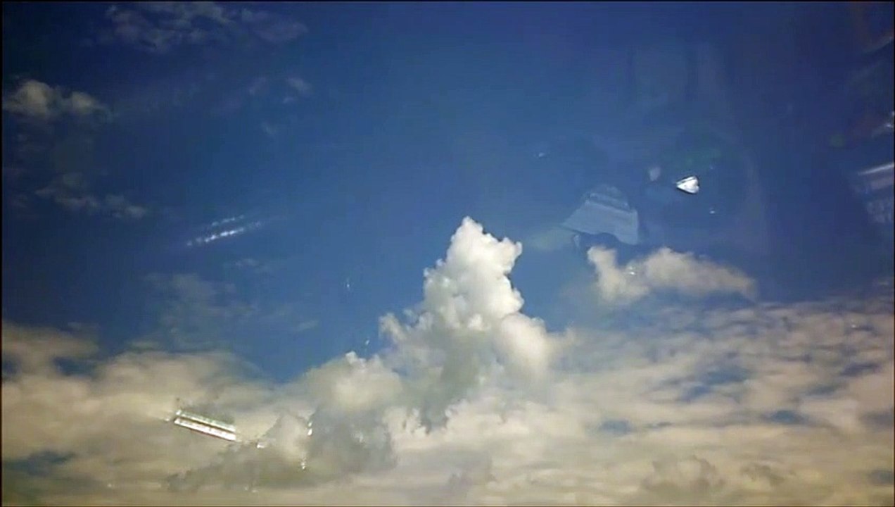 MCH 354 IMAGE OF WINDSHIELD FLUFFY WHITE CLOUDS OF HOT SUMMER DAYS DOG DAYS OF SUMMER .