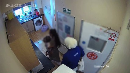 CCTV footage showing two men holding a woman at knifepoint in her home in Wandsworth