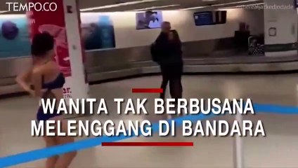 Ditangkap,  Wanita Berjalan di Bandara lalu Duduk di Atas Mobil Polisi Tanpa Baju
