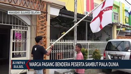Warga Pasang Bendera Peserta Sambut Piala Dunia