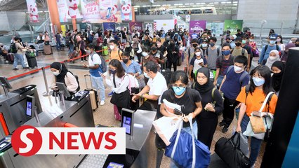 Malaysians rush home to vote