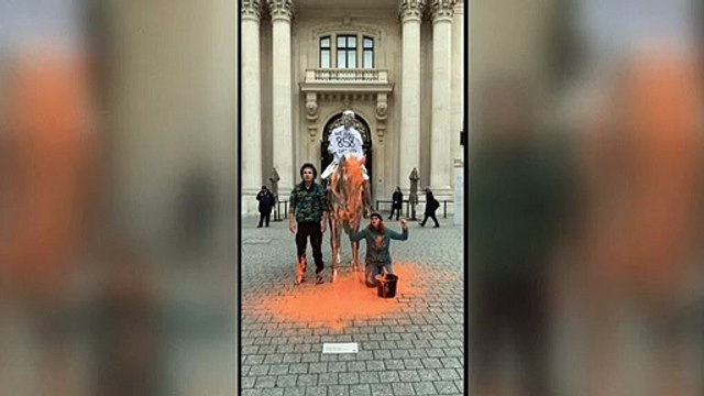 Climate activists pour paint on Charles Ray sculpture in Paris