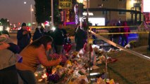 Mourners gather at memorial for victims of shooting at LGBTQ  nightclub in Colorado