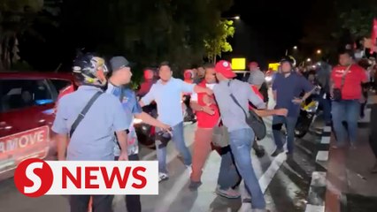 GE15: Raucous supporters celebrate PN’s win in front of Nurul Izzah’s service centre