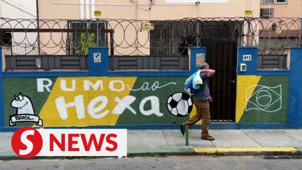 Brazil neighbourhood bursts with art and colour to support World Cup team