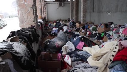 Ukrayna'da tahrip edilen Moşçun köyündeki siviller kış şartlarında hayata tutunmaya çalışıyor