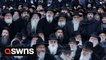 Thousands of Hasidic rabbis clad for a 'class picture' to mark the end of an international conference