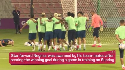 Neymar swarmed after winning goal in Brazil training