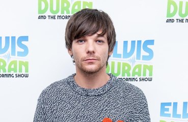 Louis Tomlinson thought about hiding his identity whilst putting out music