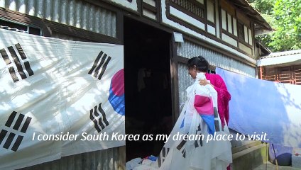 Spurning World Cup favourites, Bangladeshi duo hoist Korean colours