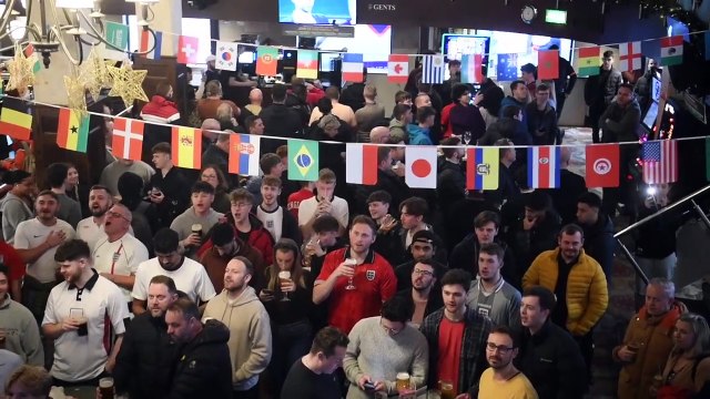 England fans celebrating at Beckett's Bank in Leeds as England beat Iran in their first game of the World Cup