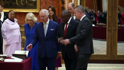 Royals view South Africa photo collection with President