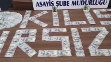 Bir otomobilden 38 bin 900 dolar çalan zanlı tutuklandı