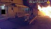 Wisconsin police officer alerts residents to garage engulfed in flames next to houses during night shift