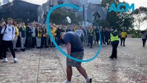 Socceroos fans throw bottles at French 'supporters' in Federation Square