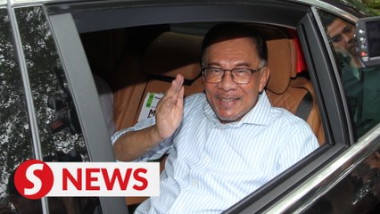 Going out for a movie, quips Anwar while leaving Kajang house