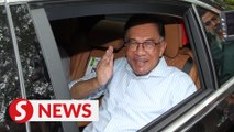 Going out for a movie, quips Anwar while leaving Kajang house