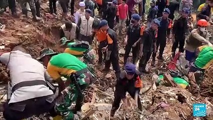 Traumatised relatives await news of missing in quake-hit Indonesia