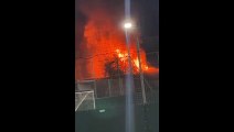 Tottenham fire: Huge blaze destroys car workshop as 70 firefighters tackle flames