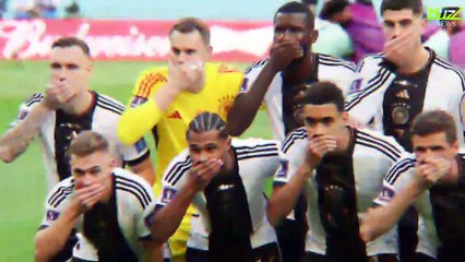 Germany team cover their mouths in team photo after not being allowed to wear the OneLove armband