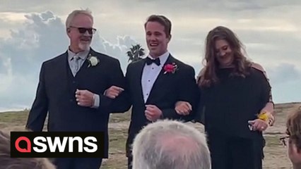 A group of high school students surprised their teacher - by crashing his wedding