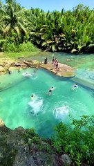 Kids Jump Into Natural Spring