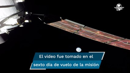 Artemis I capta a la Tierra saliendo detrás de la Luna