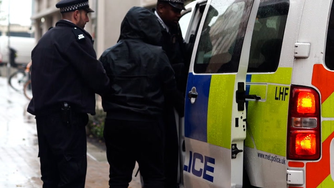 Metropolitan Police raid homes in UK’s biggest-ever cyber-fraud sting