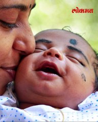 सहा दिवसाच्या बाळाला वाचवण्यासाठी  एका हाताने अधू असलेल्या वडिलांची  बिबट्याशी झुंज-