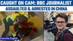 BBC journalist covering Covid protests assaulted and detained in China | Watch | Oneindia News*News