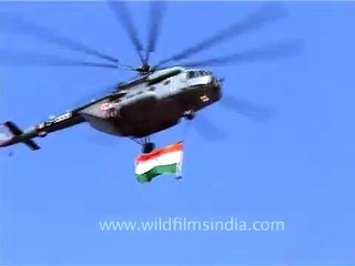 Army helicopter carrying the tri-colour Indian flag on R-day