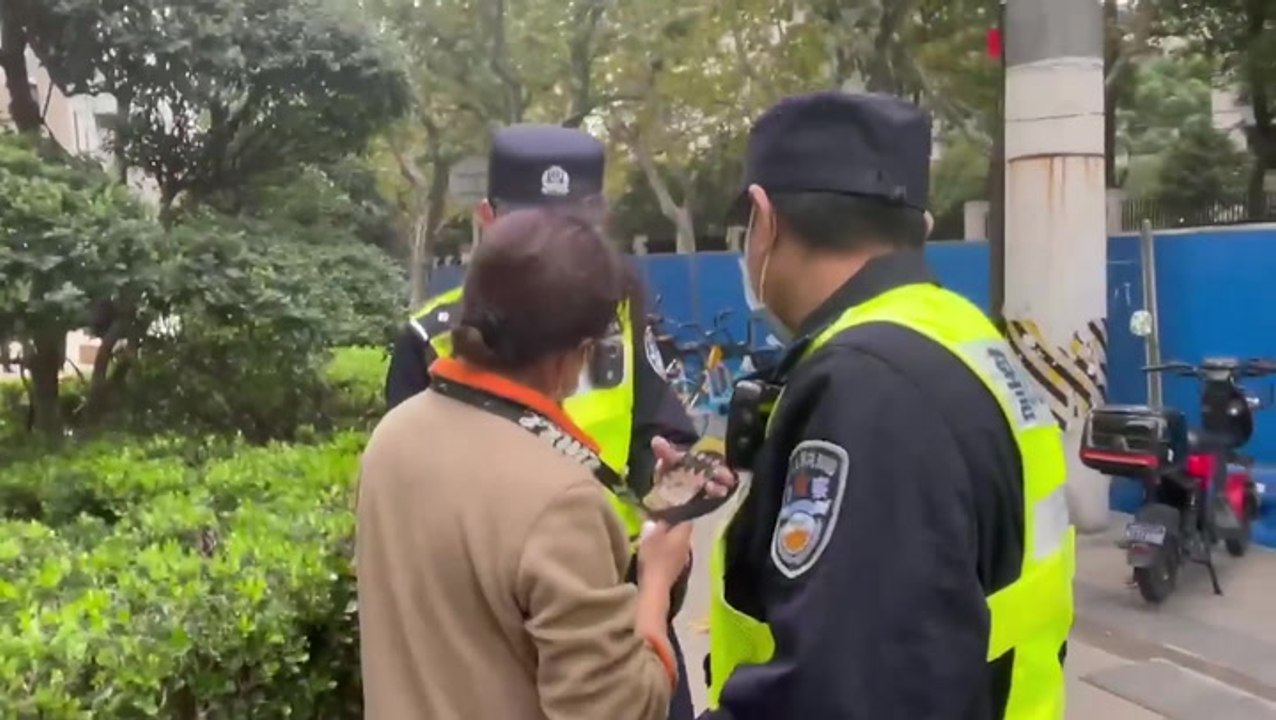 Chinese police ‘force civilians to delete photos from phones’ amid anti-lockdown protests